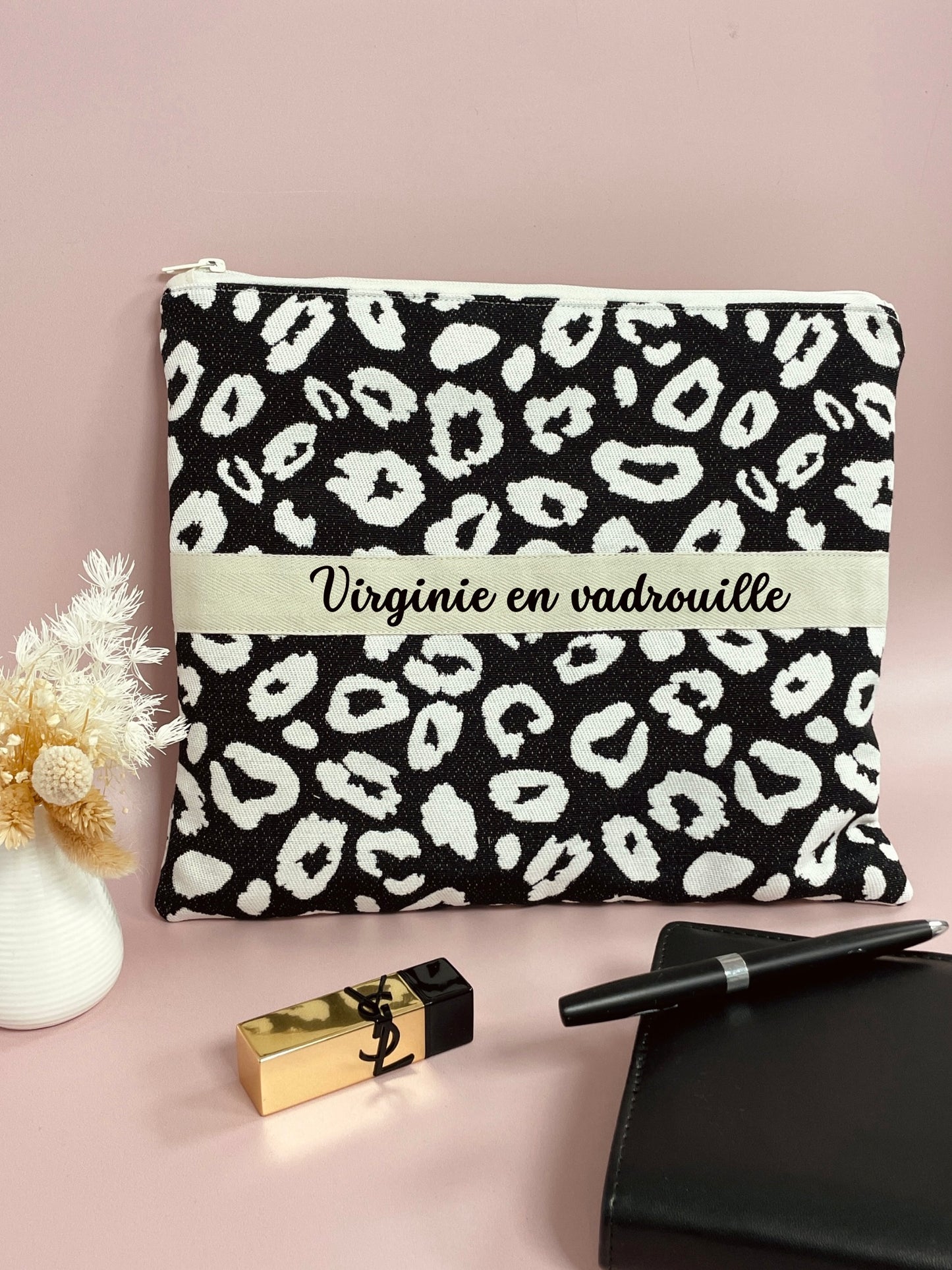 Grande pochette léopard noir ou beige